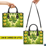 Multiple views of gold heart clover handbag with green four-leaf motif