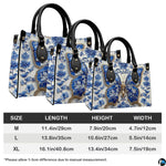 Side angle view of blue porcelain butterfly handbag and wallet