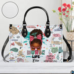 Angled perspective showing nurse illustration and colorful doodle artwork on handbag