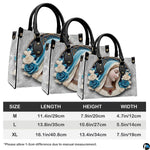 Size comparison chart showing three dimensions for the Virgin Mary cameo handbag