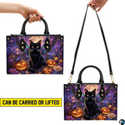 Demonstration graphic illustrating versatile carrying methods for the winged black cat artwork.