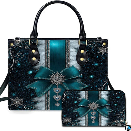 Front view of teal snowflake bow handbag and matching zippered wallet with silver holiday charms.