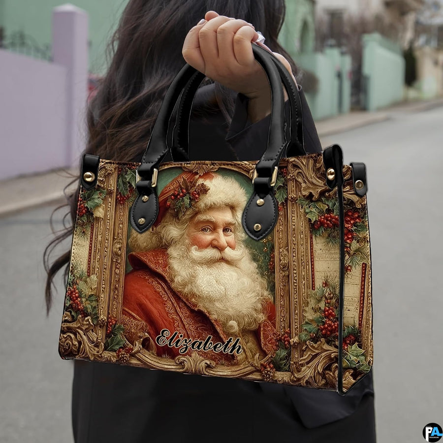Outdoor lifestyle view of model carrying the vintage Santa portrait handbag.