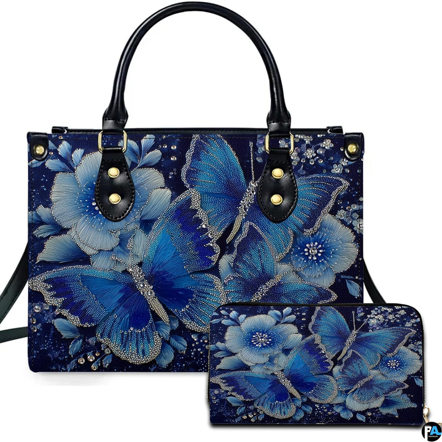 Sapphire butterfly handbag and matching zip wallet displayed against studio background with floral details.