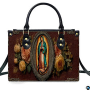 Close-up view of Virgin of Guadalupe icon within ornate golden filigree oval frame