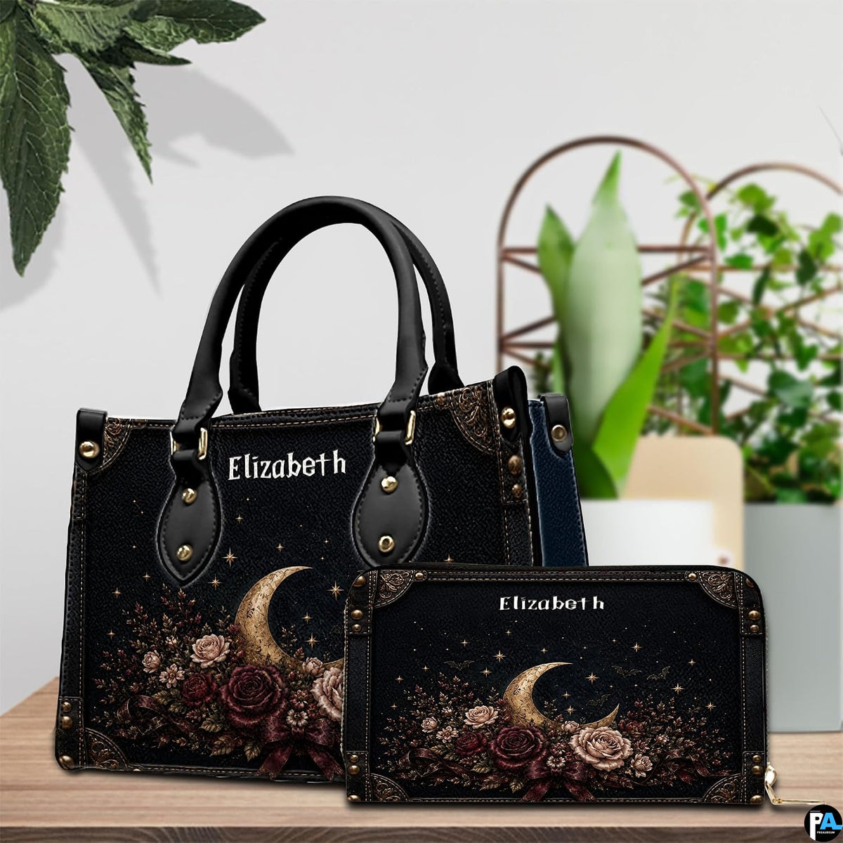 Frontal presentation highlighting the crescent moon art design on the primary accessory silhouette.
