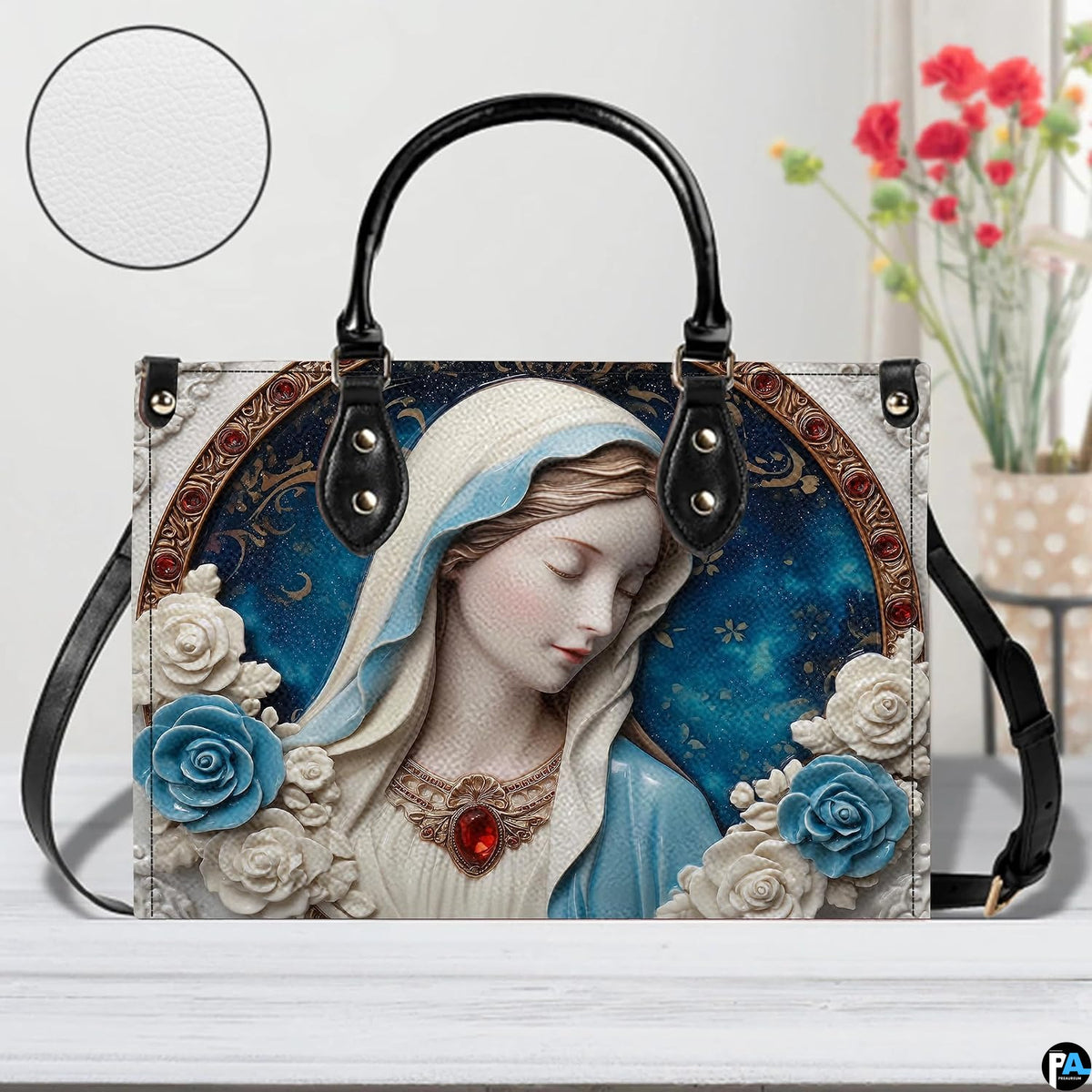 Porcelain cameo handbag shown on white wooden table with texture swatch and background floral vase.