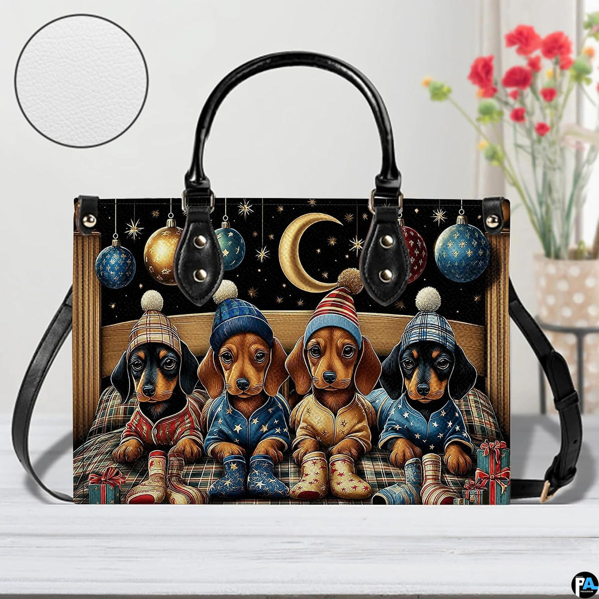 Macro close-up highlighting fine artistic details in the dachshund puppies' faces and pompom beanies.