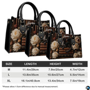 Lifestyle presentation of black dragon handbag and wallet set with styling accessories