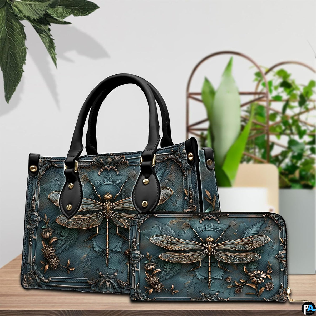 Side profile of bronze dragonfly handbag showing continuous patina teal and baroque border along gusset