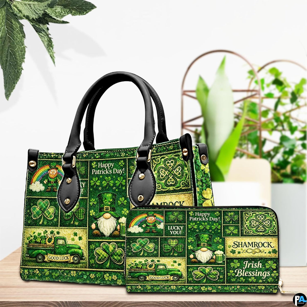 Green Celtic patchwork handbag and matching wallet on table