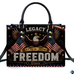 Close-up front view of matching zippered wallet showing patriotic eagle artwork