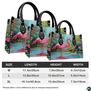 Matching zip wallet showing identical tropical flamingo and botanical garden art.