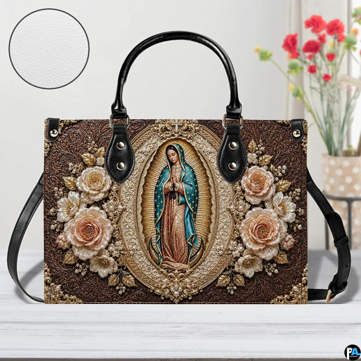 Guadalupe medallion handbag displayed with circular surface texture zoom inset