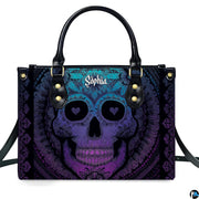 Turquoise violet sugar skull mandala handbag displayed alone on white background.