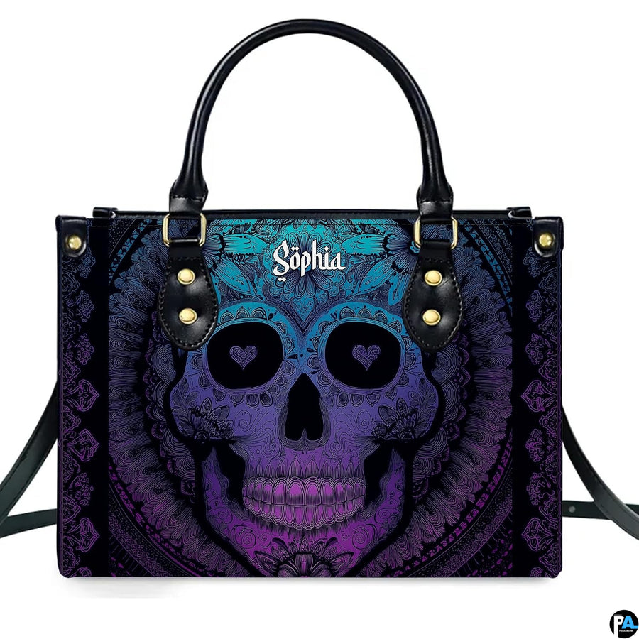 Turquoise violet sugar skull mandala handbag displayed alone on white background.