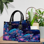 Lifestyle display showing the celestial sea turtle handbag worn over the shoulder.