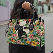 Coordinating black cat wildflower tote handbag and zippered wallet duo