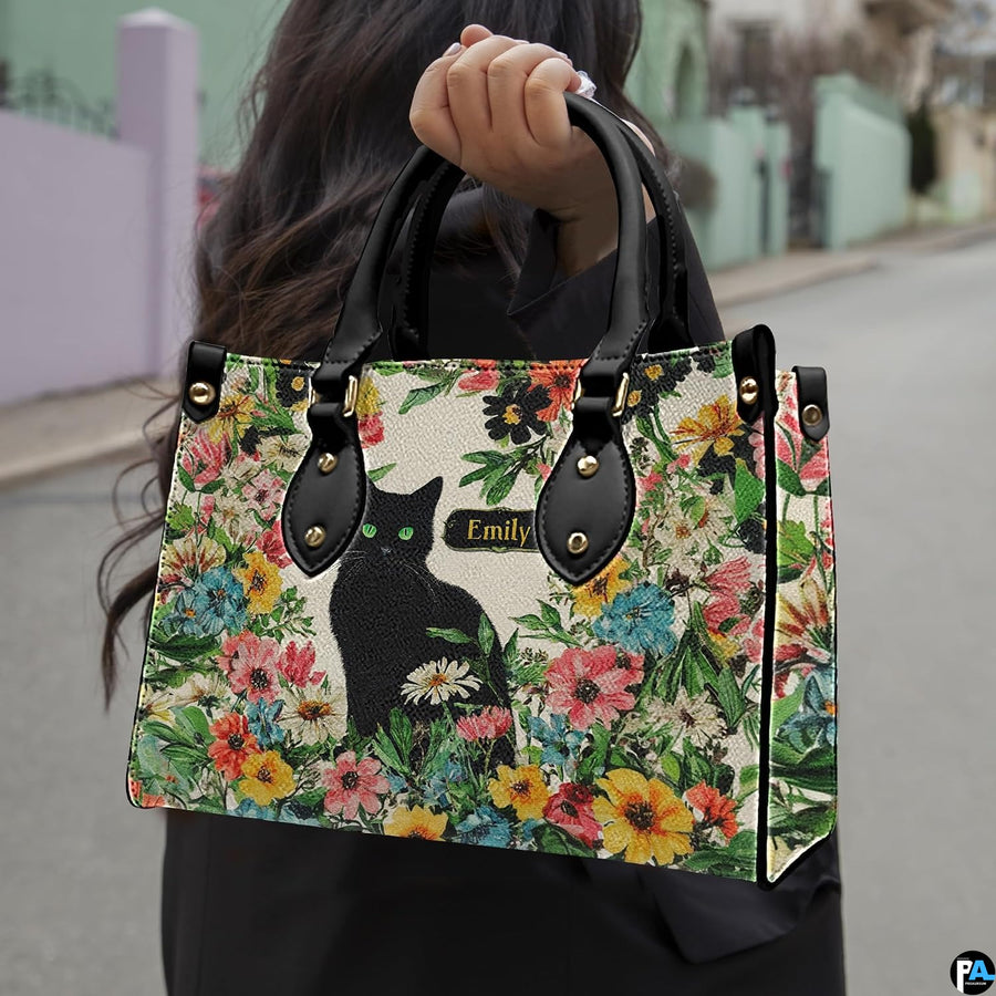 Coordinating black cat wildflower tote handbag and zippered wallet duo