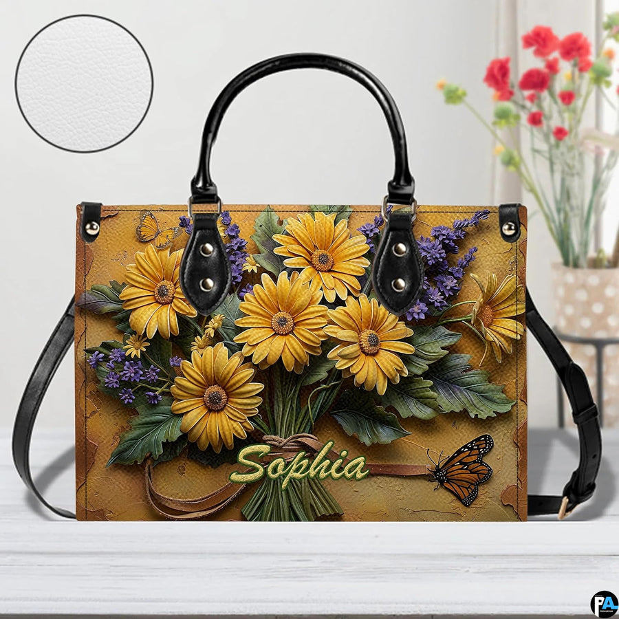 Close-up front view of matching zippered wallet showing daisy bouquet