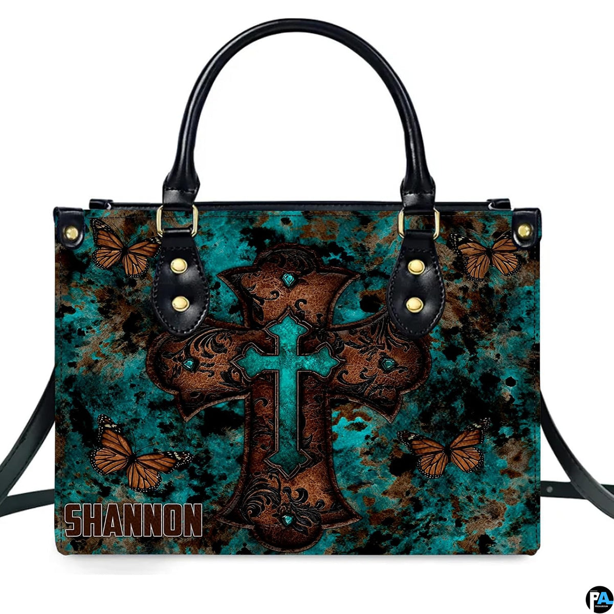 Side profile view of structured turquoise cross butterfly handbag.