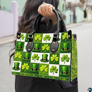 Model carrying green clover and top hat checkerboard handbag