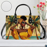 Lifestyle tabletop presentation of the tropical sunglasses piece beside red floral decorations.