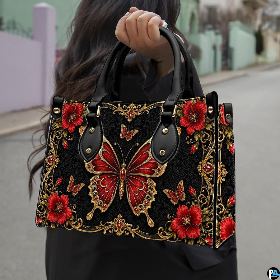 Outdoor lifestyle perspective showing baroque red butterfly artwork held by pedestrian along street.