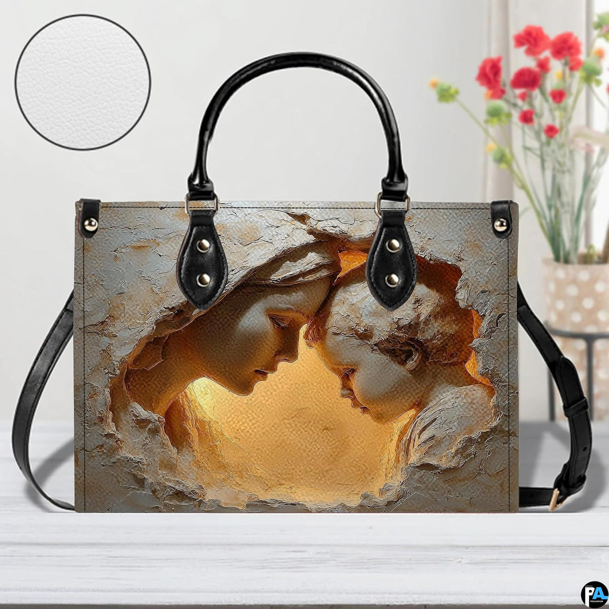 Solid black back view of Virgin Mary devotional handbag with dual top handles