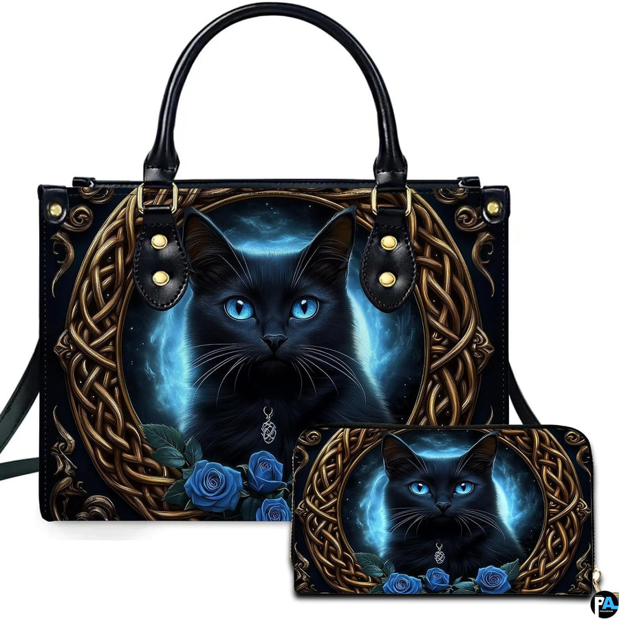 Studio view showing Celtic black cat and blue rose artwork alongside matching companion accessory on white surface.