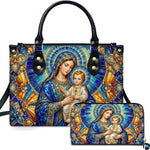 Front view of stained glass Madonna and Child handbag and matching wallet set in vibrant cobalt and gold