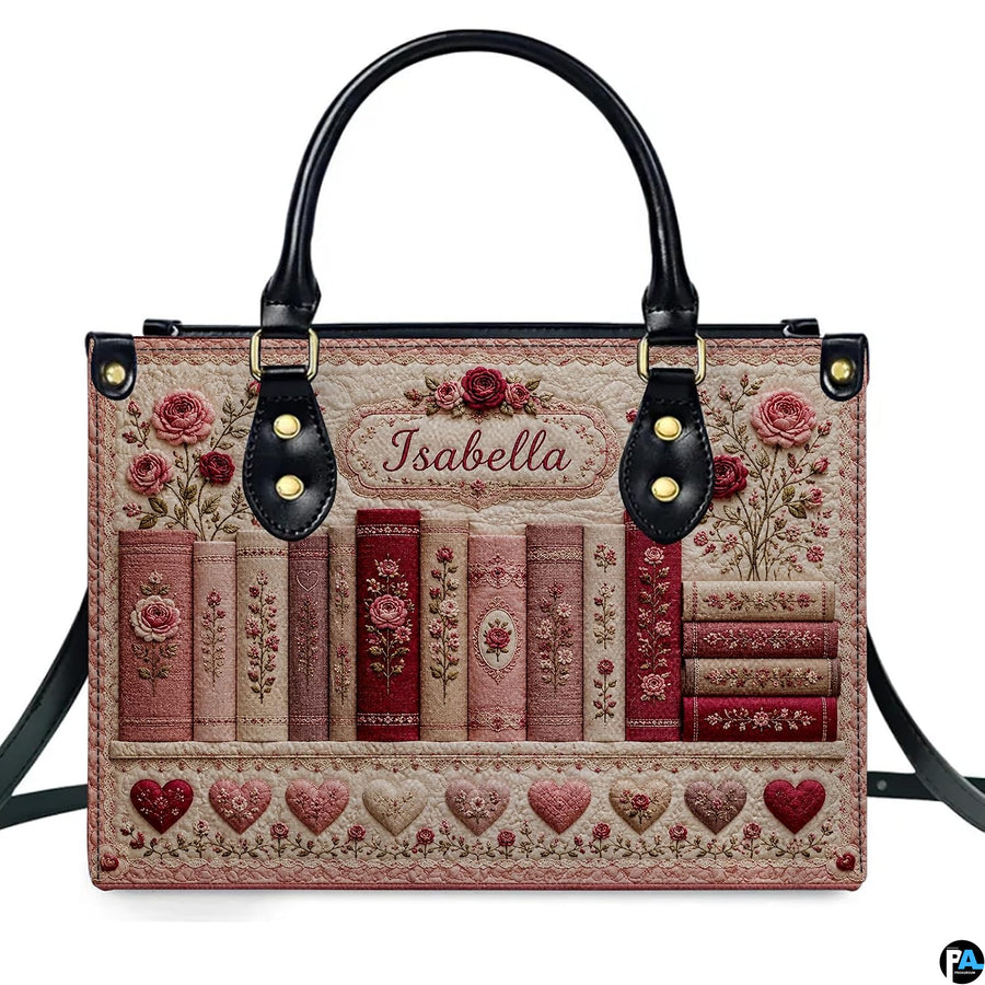 Matching zippered wallet showing coordinated quilted book spines and embroidered rose motifs.