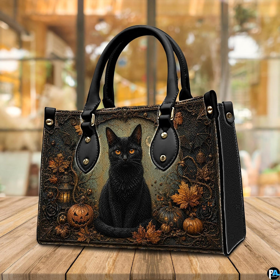 Cafe table arrangement presenting Halloween cat artwork beside sunlit window.