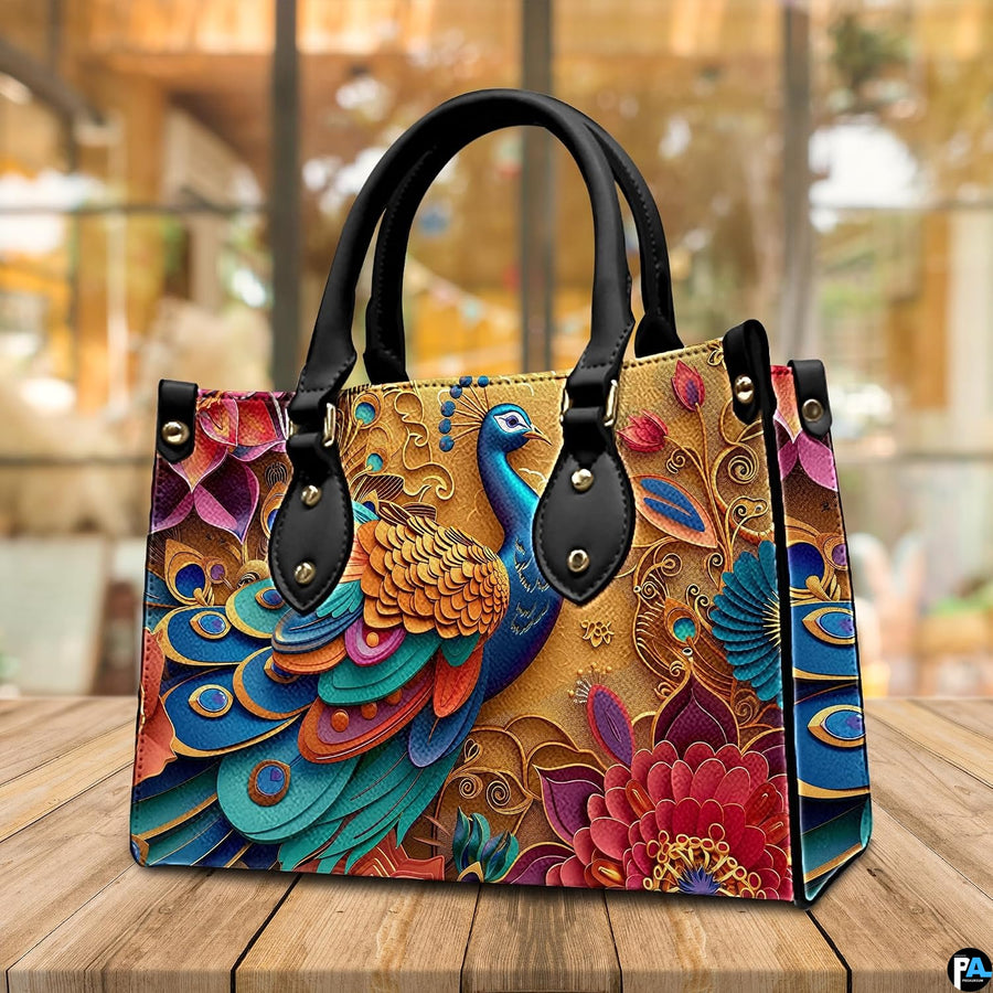 Colorful peacock handbag on table with gold scrollwork and pink flowers