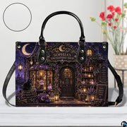 Apothecary cottage handbag and wallet displayed on wooden table beside potted plant.