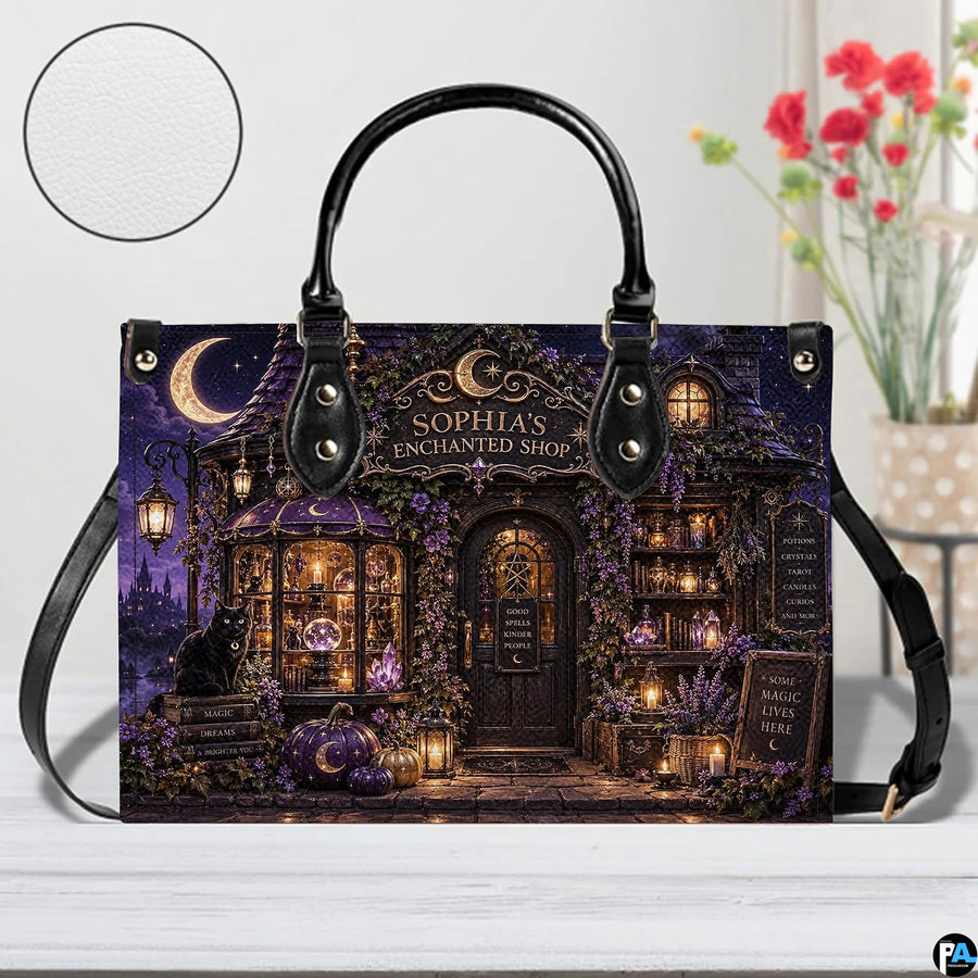 Apothecary cottage handbag and wallet displayed on wooden table beside potted plant.