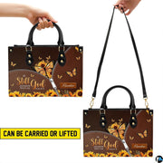 Interior compartment view of devotional handbag displaying inner lining and open storage space.