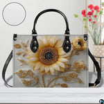 Top down view of sunflower handbag showing zipper closure and interior opening.