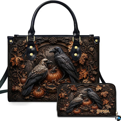Gothic raven handbag displayed beside matching companion wallet.