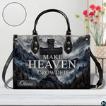 Alternative angle view showing mountain cross handbag and wallet matching pair