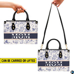 Angled perspective showcasing blue toile floral artwork beside matching companion accessory.