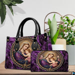 Coordinating royal purple madonna handbag and wallet displayed together on tabletop beside green plant.