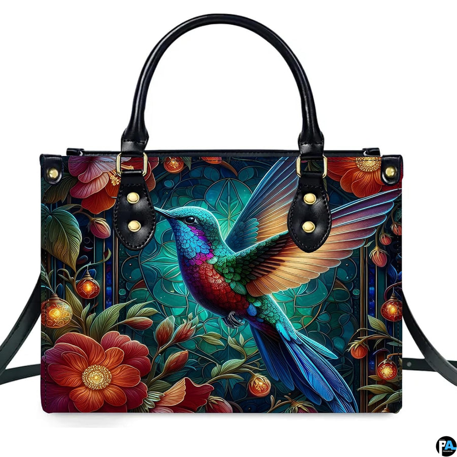 Detailed view of glowing fairy lantern orbs and rich botanical foliage across handbag.