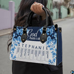 Outdoor street view displaying blue botanical floral pattern with dark navy header held against city backdrop.