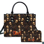 Dark botanical skull pattern with golden bone portraits and red berries beside matching accessory surface.