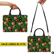 Carrying options demonstrated with top handle carry and shoulder strap wear for Christmas cat handbag