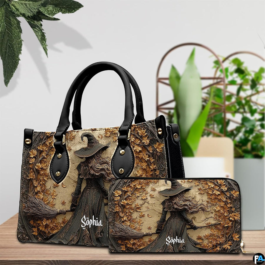 Gothic autumn witch handbag and matching wallet set on wooden table near houseplant.