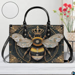 Side profile view showing structured silhouette and black carrying handles of the handbag.