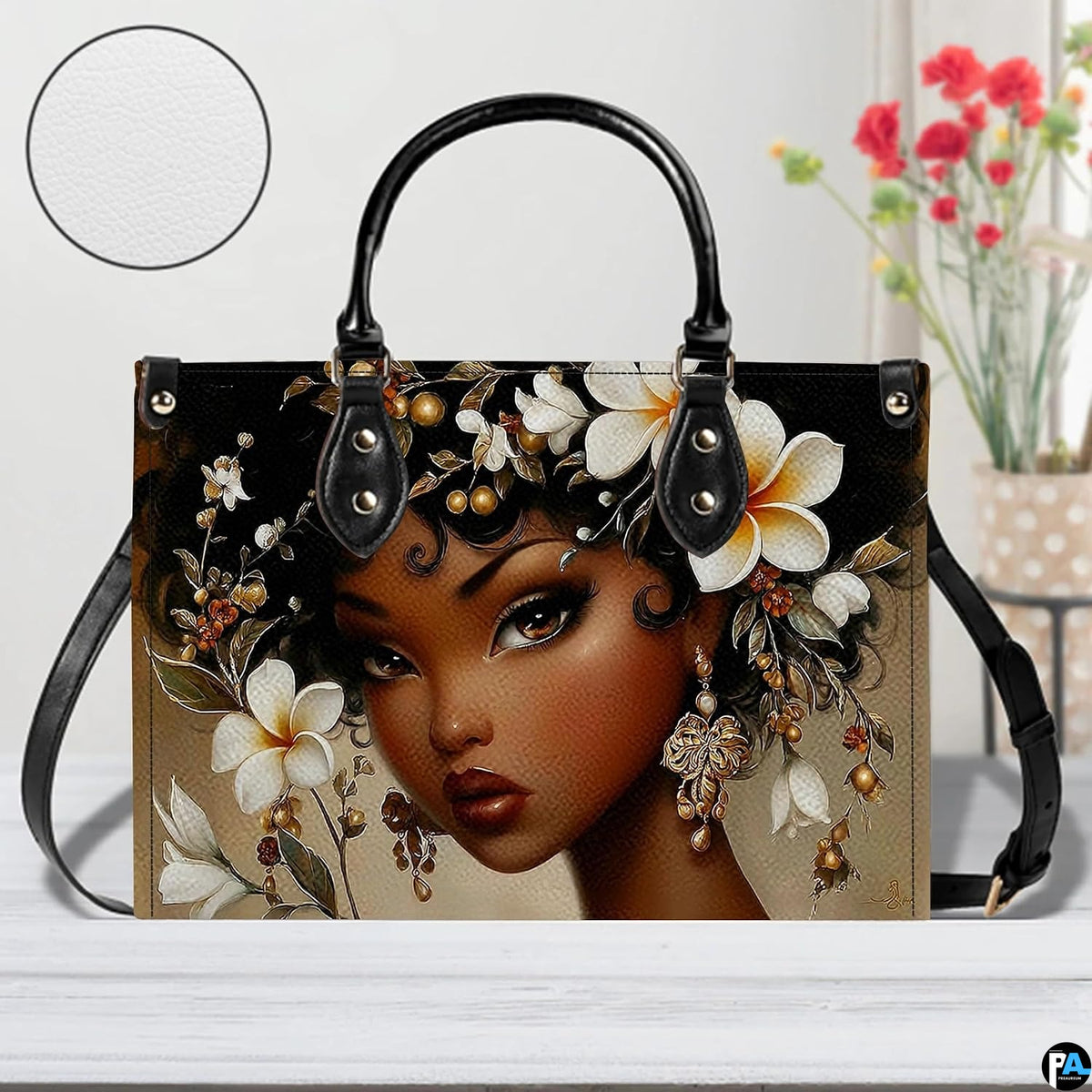 Studio display of the floral portrait motif on a white wooden surface with decorative background blossoms.