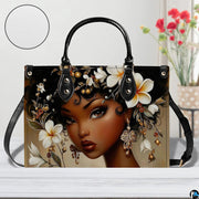 Studio display of the floral portrait motif on a white wooden surface with decorative background blossoms.